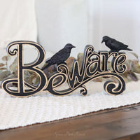 Black and Gold Resin Beware Cutout