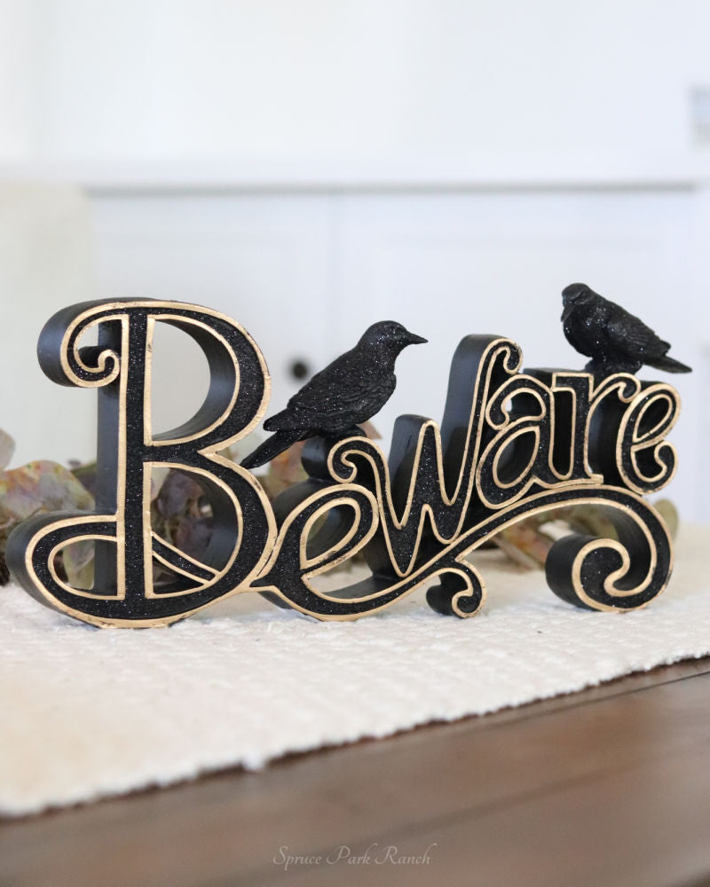 Black and Gold Resin Beware Cutout