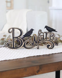 Black and Gold Resin Beware Cutout