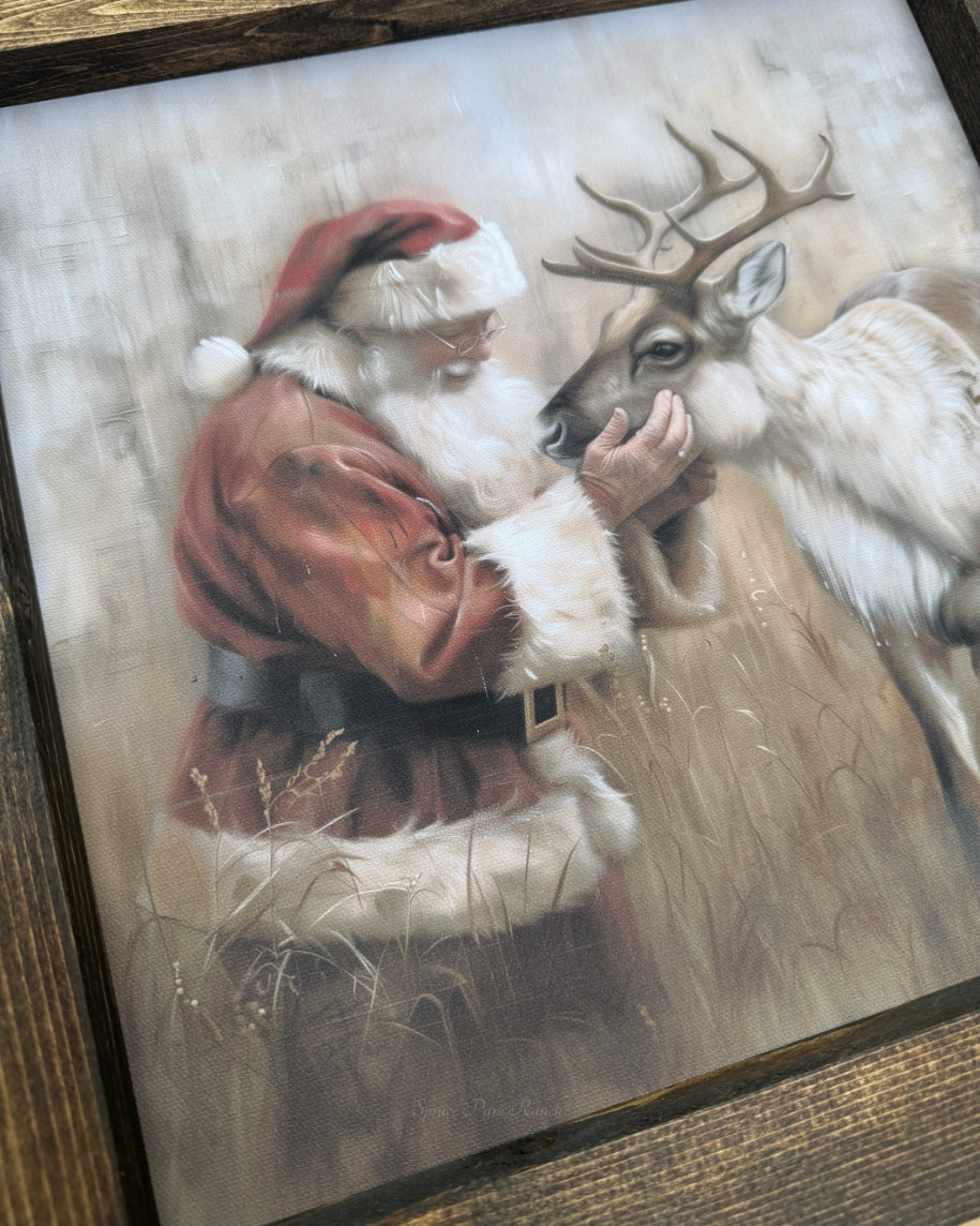 Santa With Reindeer Canvas Print