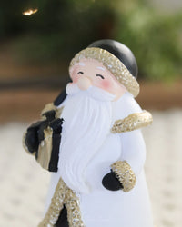 Black and Gold Santa Figurine