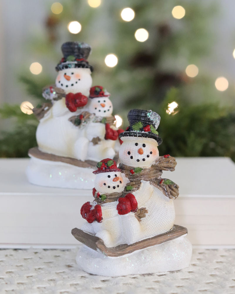 Sledding Snowman Resin