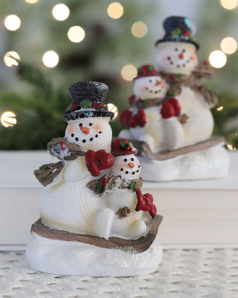 Sledding Snowman Resin